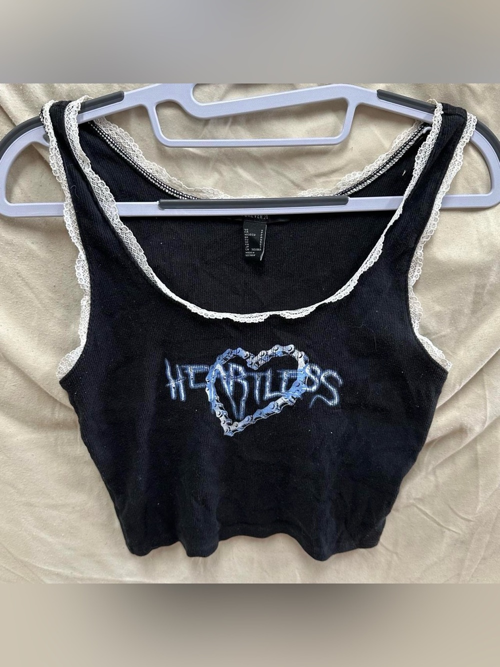 Black, blue and white lace grunge crop top cami with graphic “heartless”.